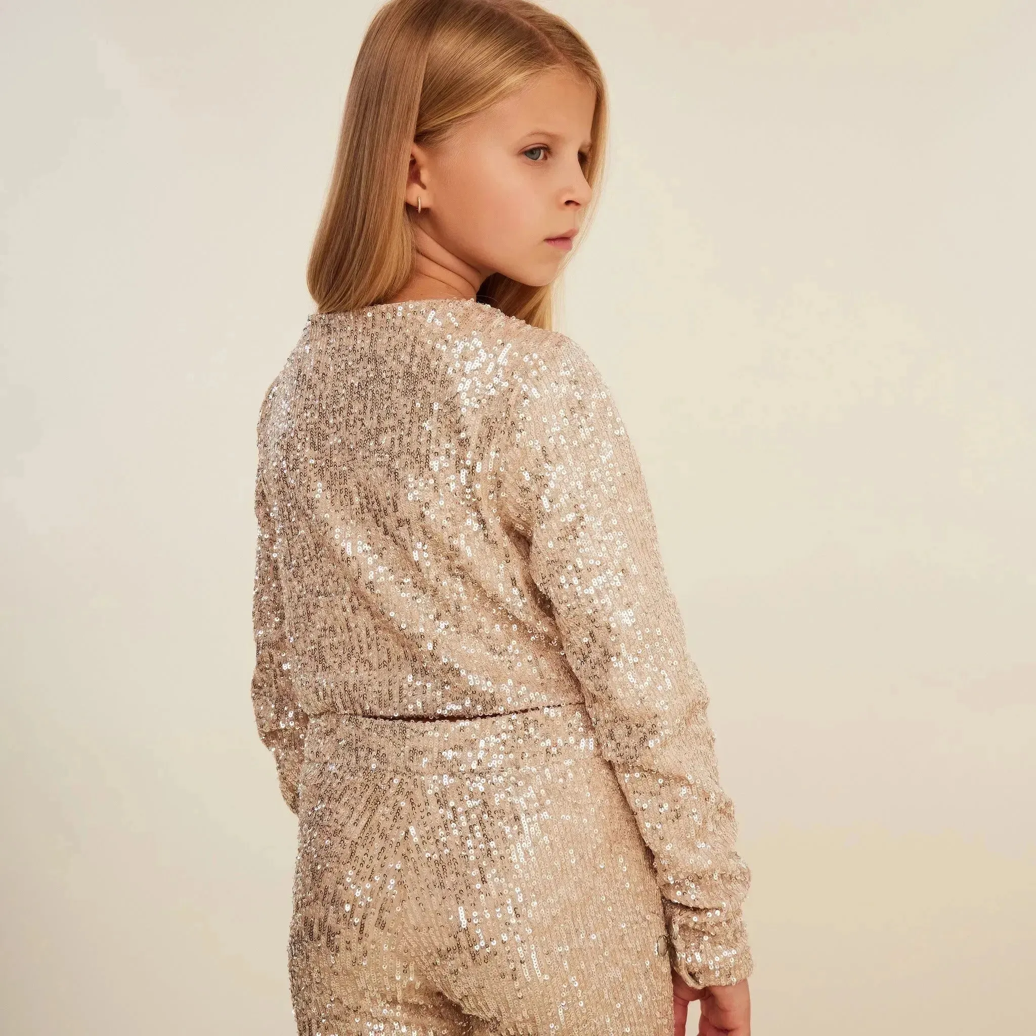 Jersey Sequin Top with Ruffled Sleeves and Button Detail